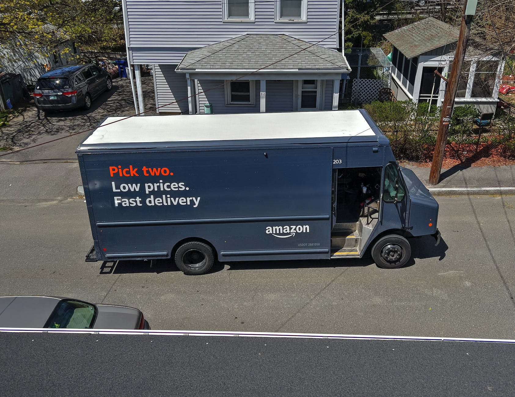 amazon prime delivery truck on street